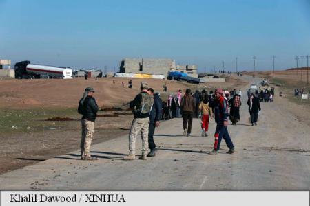 Mii de refugiaţi se întorc în oraşul lor, Mosul
