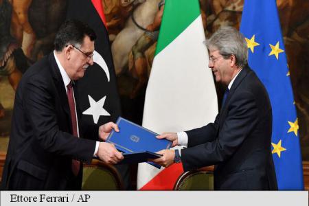 Italia și Libia au semnat un acord pentru a frâna fluxul de migranți
