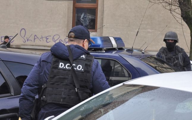 Zeci de perchezitii in Romania si in Germania intr-un dosar privind trafic de migranti