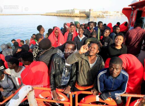 Italia vrea ca toate ţările UE să accepte o cotă de migranţi economici sau să primească mai puţine fonduri