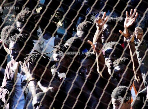Peste 600 de migranţi au pătruns din Maroc în Spania, luând cu asalt gardul ce înconjoară enclava Ceuta
