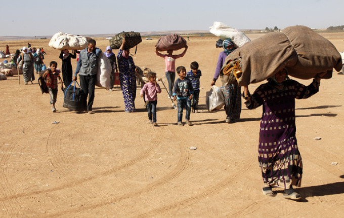 Coronavirusul îi sperie mai mult decât războiul. Ce au făcut mii de migranți din Siria